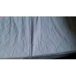 Single bed with mattress and mattress protector