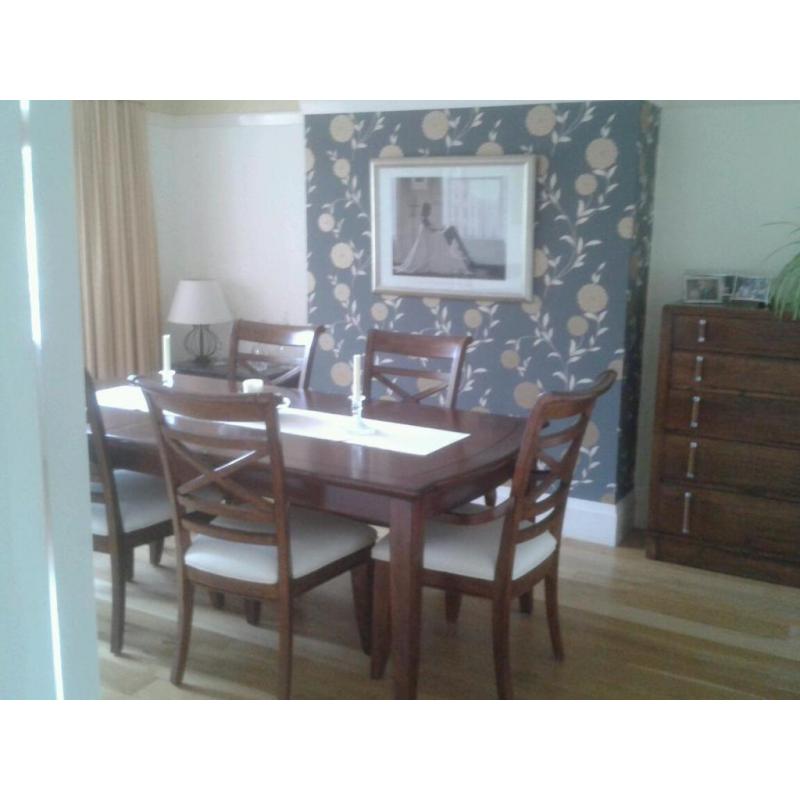 Beautiful solid wood dining table with 4 chairs and 2 carvers