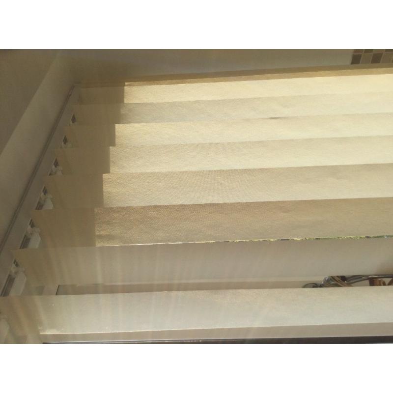 Set of 3 vertical blinds for bay window.