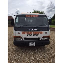 Izuzu NPR tilt and slide recovery truck