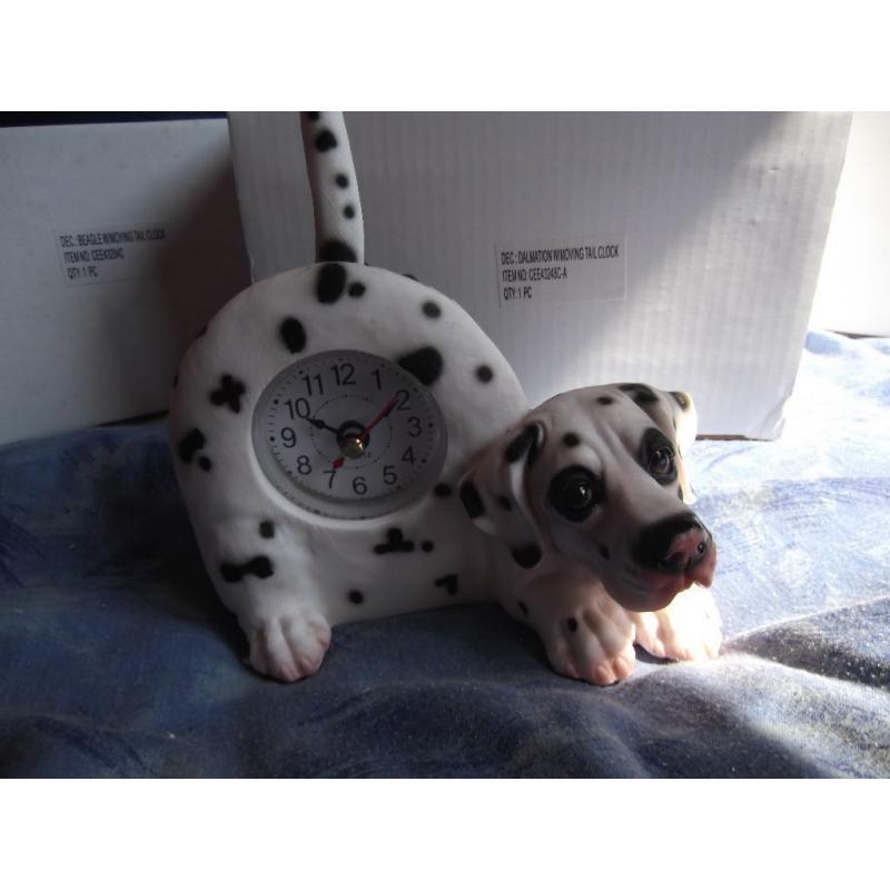 Dog clocks with wagging tails 13 in Total.