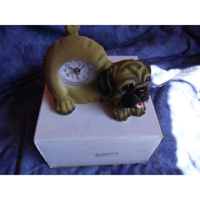 Dog clocks with wagging tails 13 in Total.