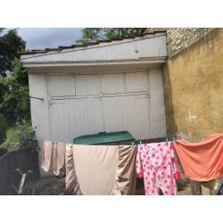 TIMBER DOUBLE DOORS TO GARAGE