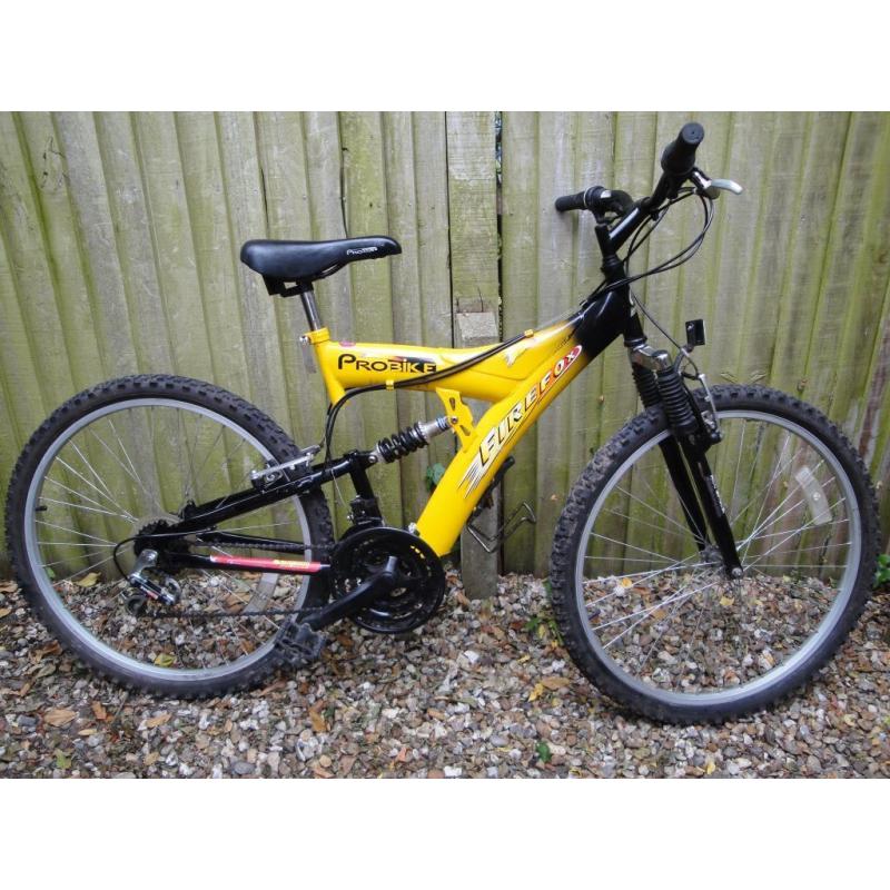 Probike adult mountain bike Fr/Rr suspension 18spd twist grip gears very good condition will deliver