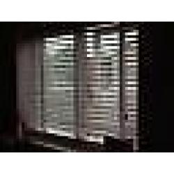 White wooden blind w cream tapes. 50mm slats/102cms width