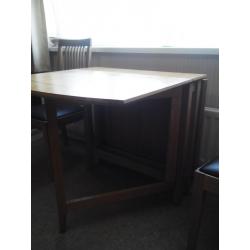 Oak Dining table and two chairs
