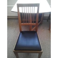 Oak Dining table and two chairs