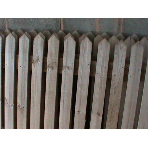 wooden fence and fence stakes