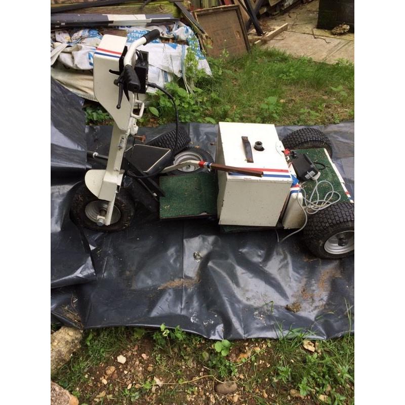 Motorised golf buggy (Rydeon) and