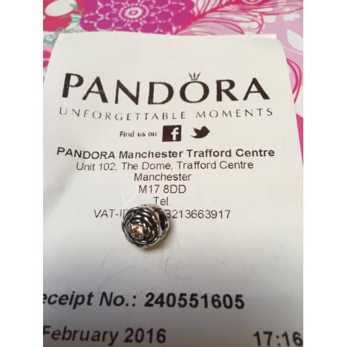 Pandora rose charm with rose gold CZ stone in the middle