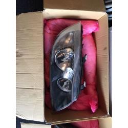 E90 Headlights OEM