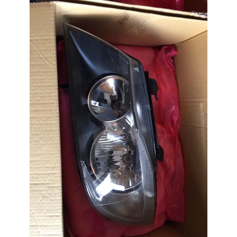 E90 Headlights OEM