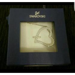 Swarkovski heart necklace.