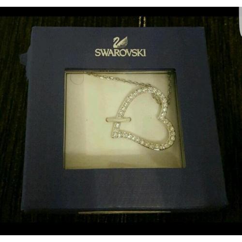 Swarkovski heart necklace.