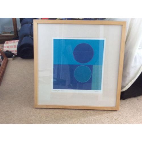 IKEA child's table,blue pictures,small brown picture,teal canvas, vase and contents