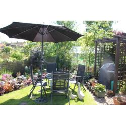 Garden Table, 4 chairs and umbrella