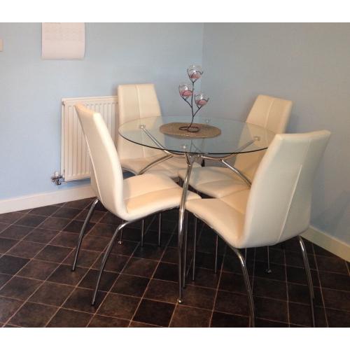 Glass top dining table and 4 chairs
