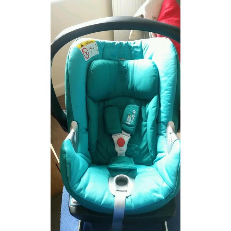 Cybex Aton Q car seat in teal with ISOFIX base