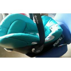 Cybex Aton Q car seat in teal with ISOFIX base