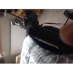 Golf clubs and trolley