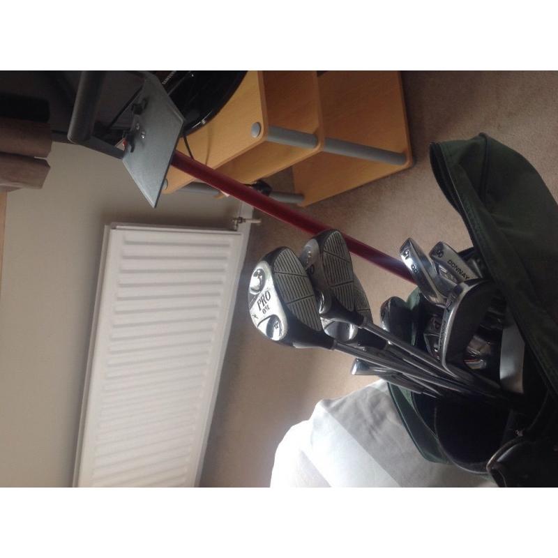 Golf clubs and trolley