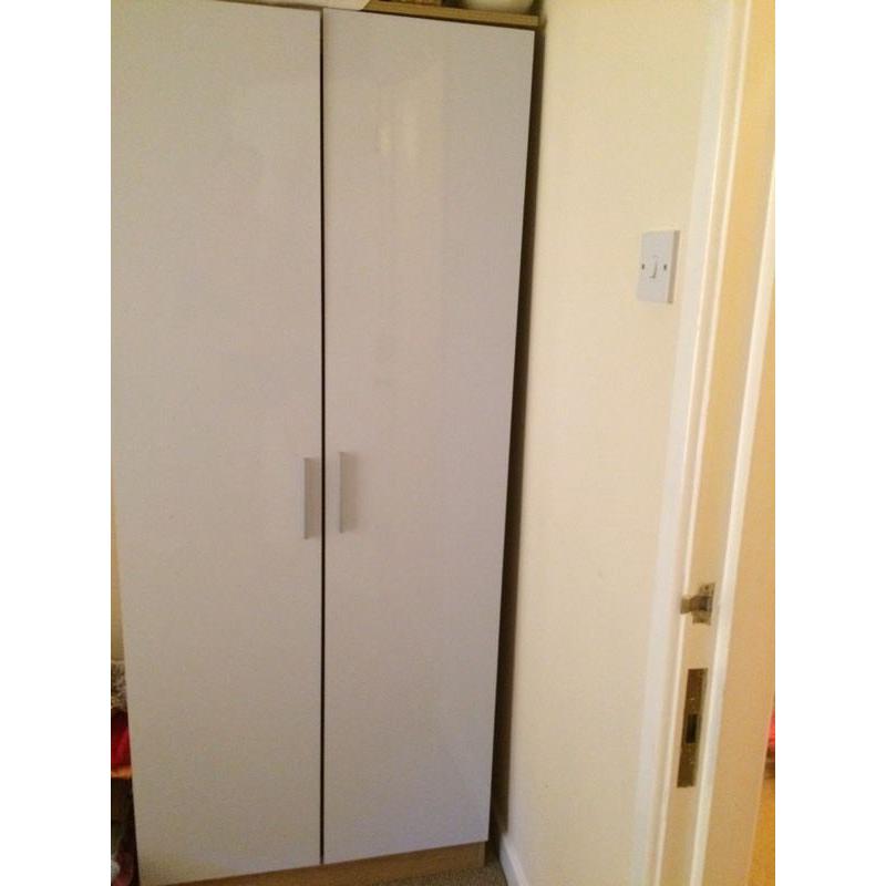 High gloss white wardrobe an bedside table