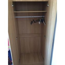 High gloss white wardrobe an bedside table