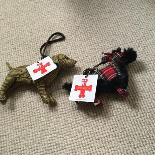 Two Fuzzynation dog shaped purses