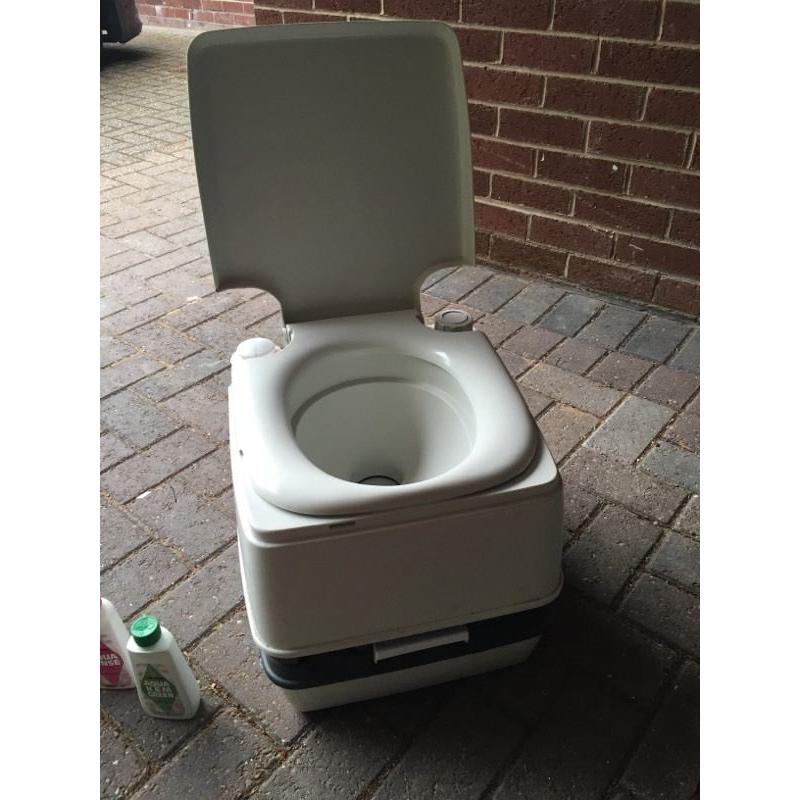 Portable camping toilet with chemicals