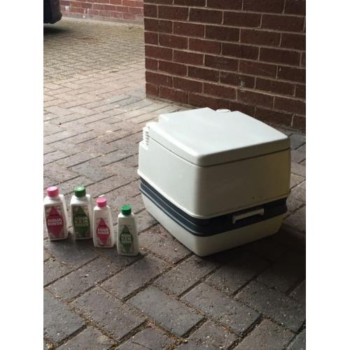 Portable camping toilet with chemicals