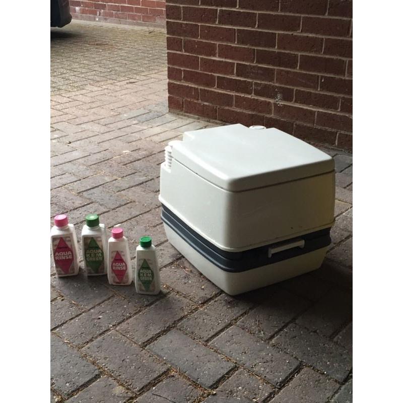 Portable camping toilet with chemicals