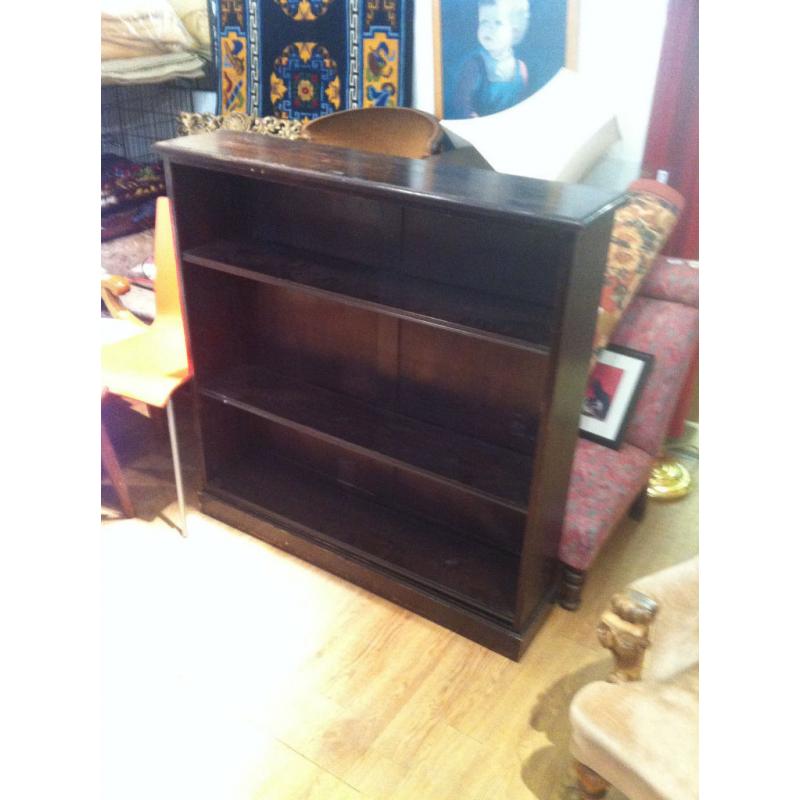 Solid oak bookcase , with adjustable shelves.