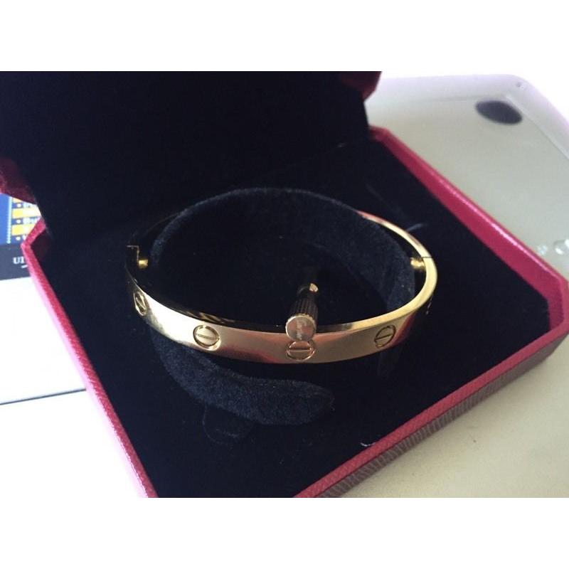 Cartier love bangle in mint condition stamped 18ct gold