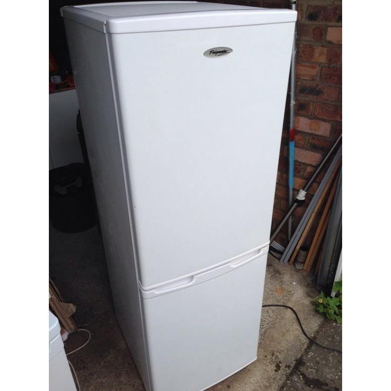 Upright fridge freezer.Delivery Offered