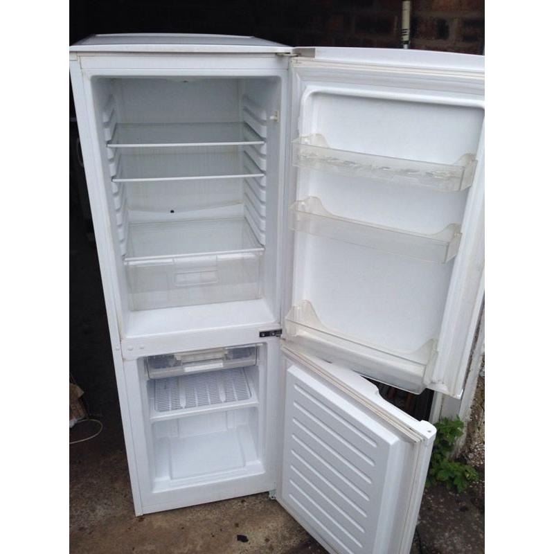 Upright fridge freezer.Delivery Offered