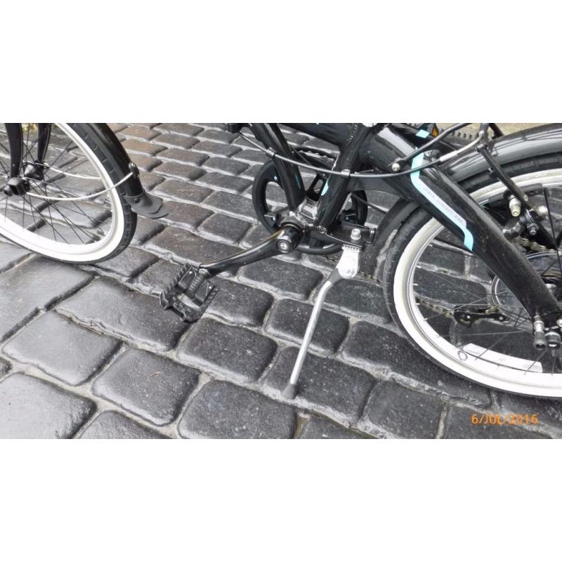 Top brand Dahon folding bike including case. As new and nearly half the current price.