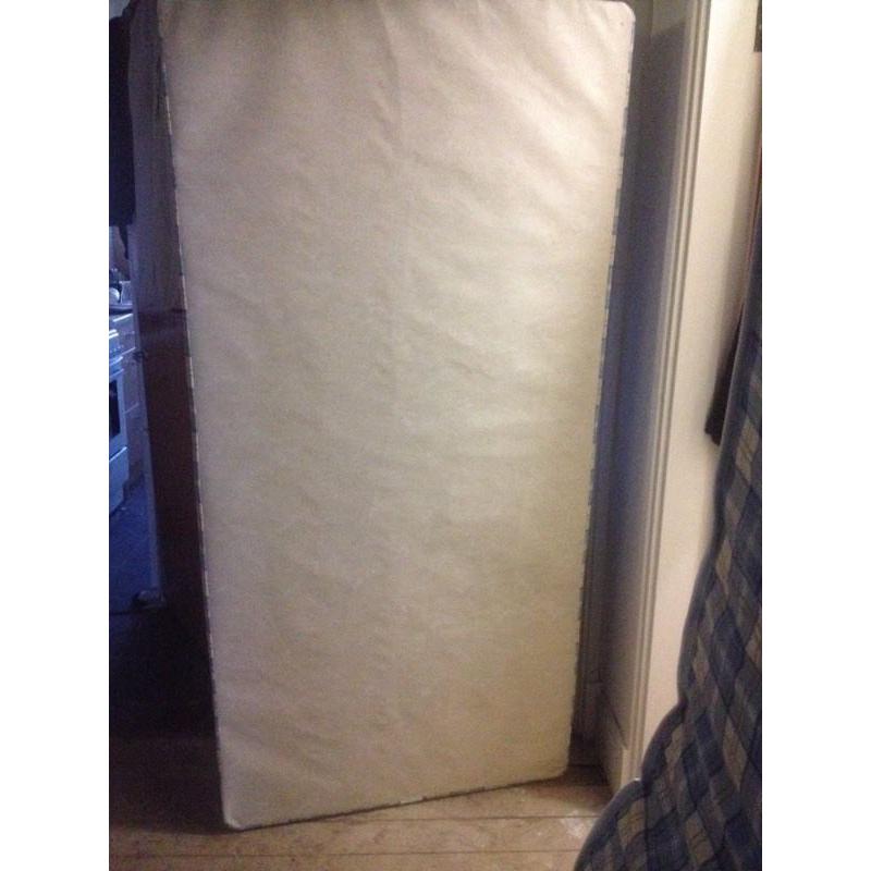 Brand new single bed with mattress never been used