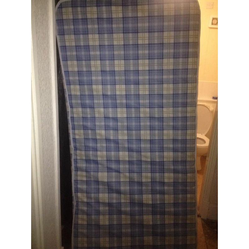 Brand new single bed with mattress never been used