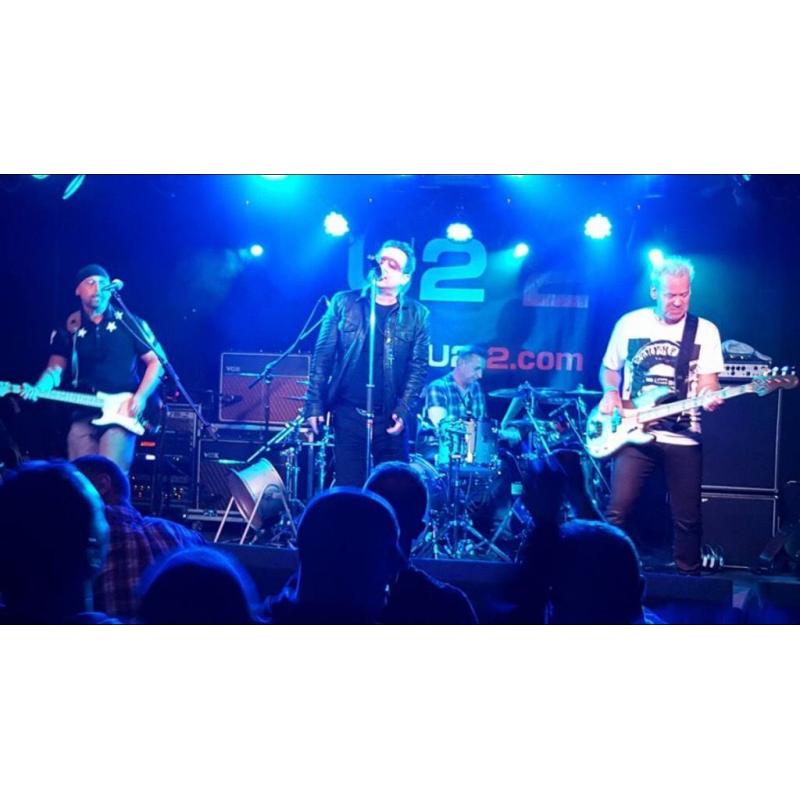 U22 the official u2 tribute band require Bono alike