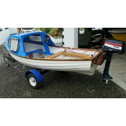 Fishing boat trailer outboard