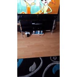 black and chrome glass tv stand
