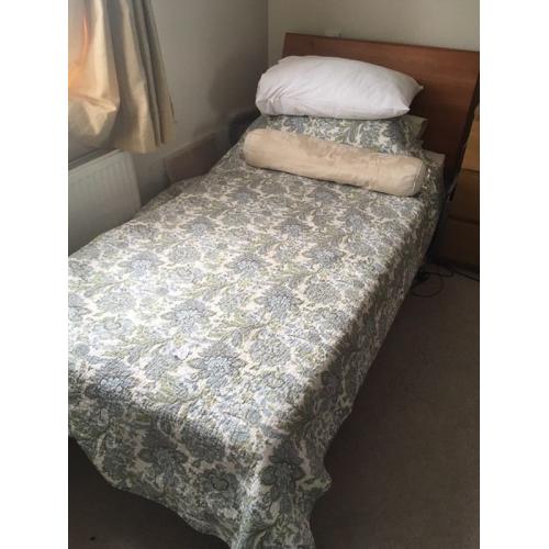 Single bed. Make: continental sleigh bed with wood head board.