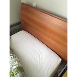 Single bed. Make: continental sleigh bed with wood head board.