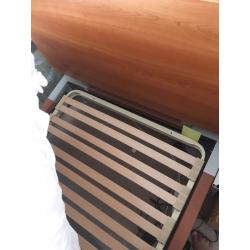 Single bed. Make: continental sleigh bed with wood head board.
