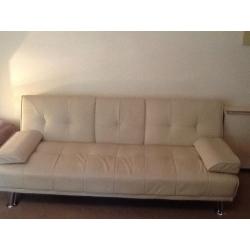 Two ivory Faux Leather Sofa Beds For Sale