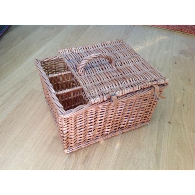 Picnic Hamper. Made of wicker with spaces for bottles and food, crockery etc.