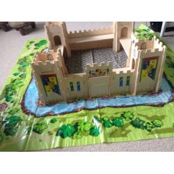 Wooden castle with working drawbridge