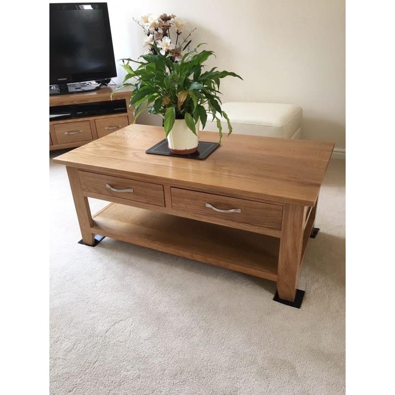 Solid teak coffee table ,tv unit,nest of 3 tables and lamp table.
