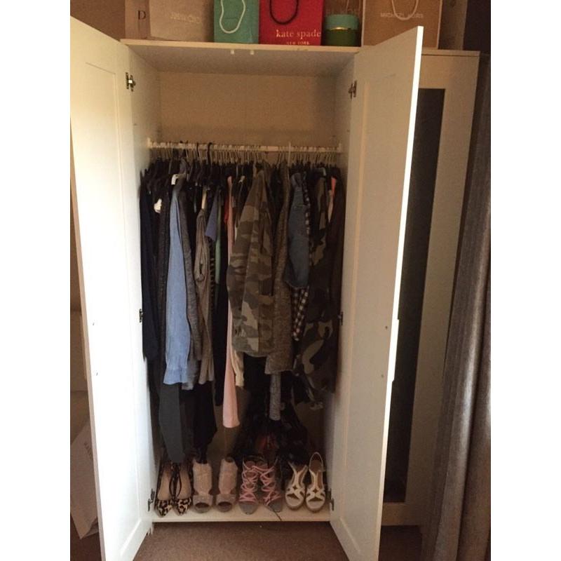 White spacious mirrored wardrobe