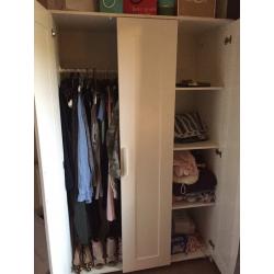 White spacious mirrored wardrobe